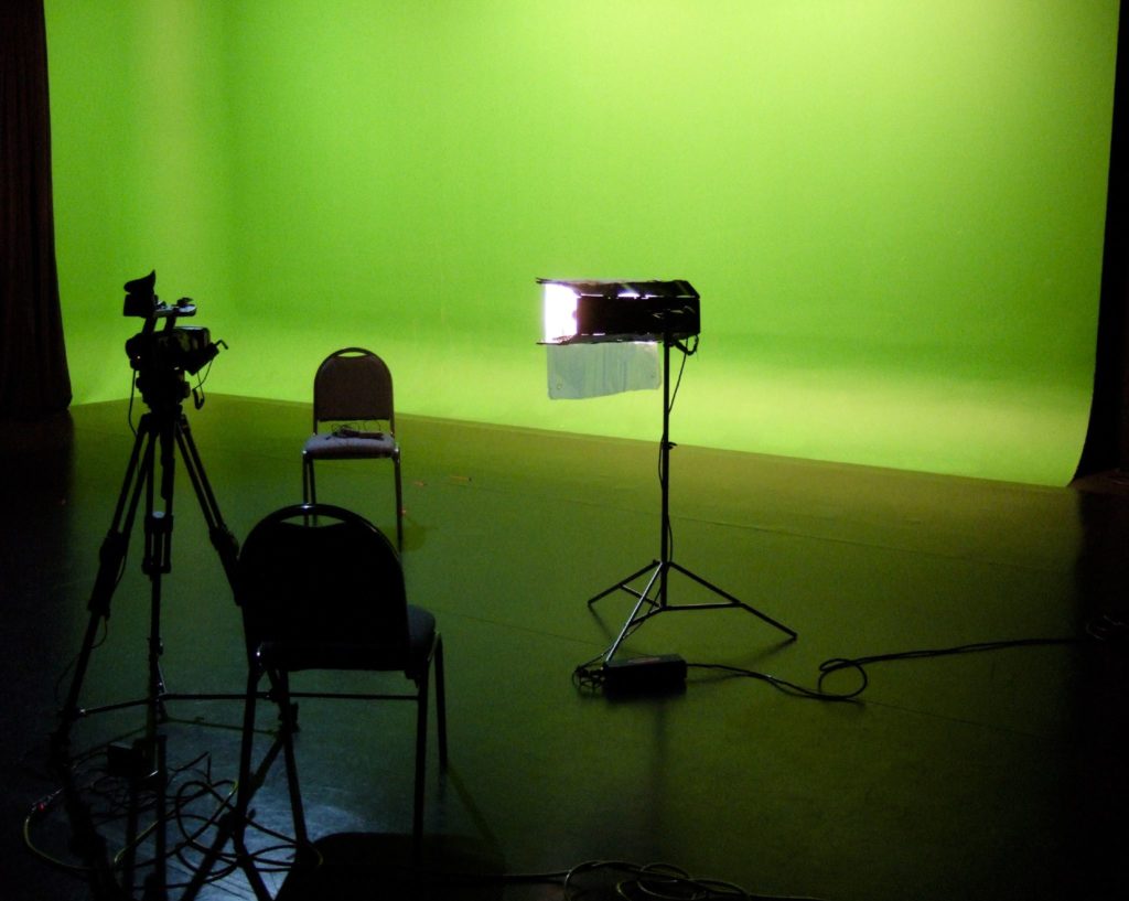 Picture of a green scene set up with lighting and cameras